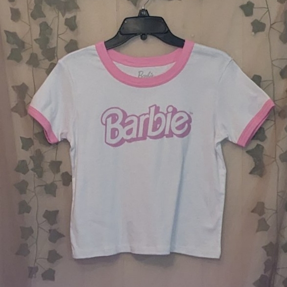 Barbie Tops - White Barbie t-shirt with pink color and arm edges. Size medium. Juniors